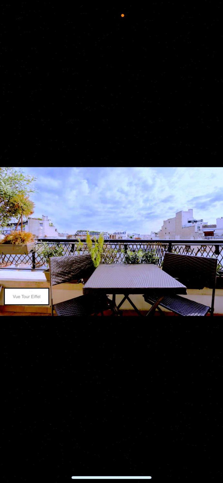 Terrasse Vue Tour Eiffel Parigi