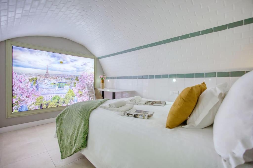 Le Nid Parisien Triplex Cosy Et Chaleureux Appartamento *