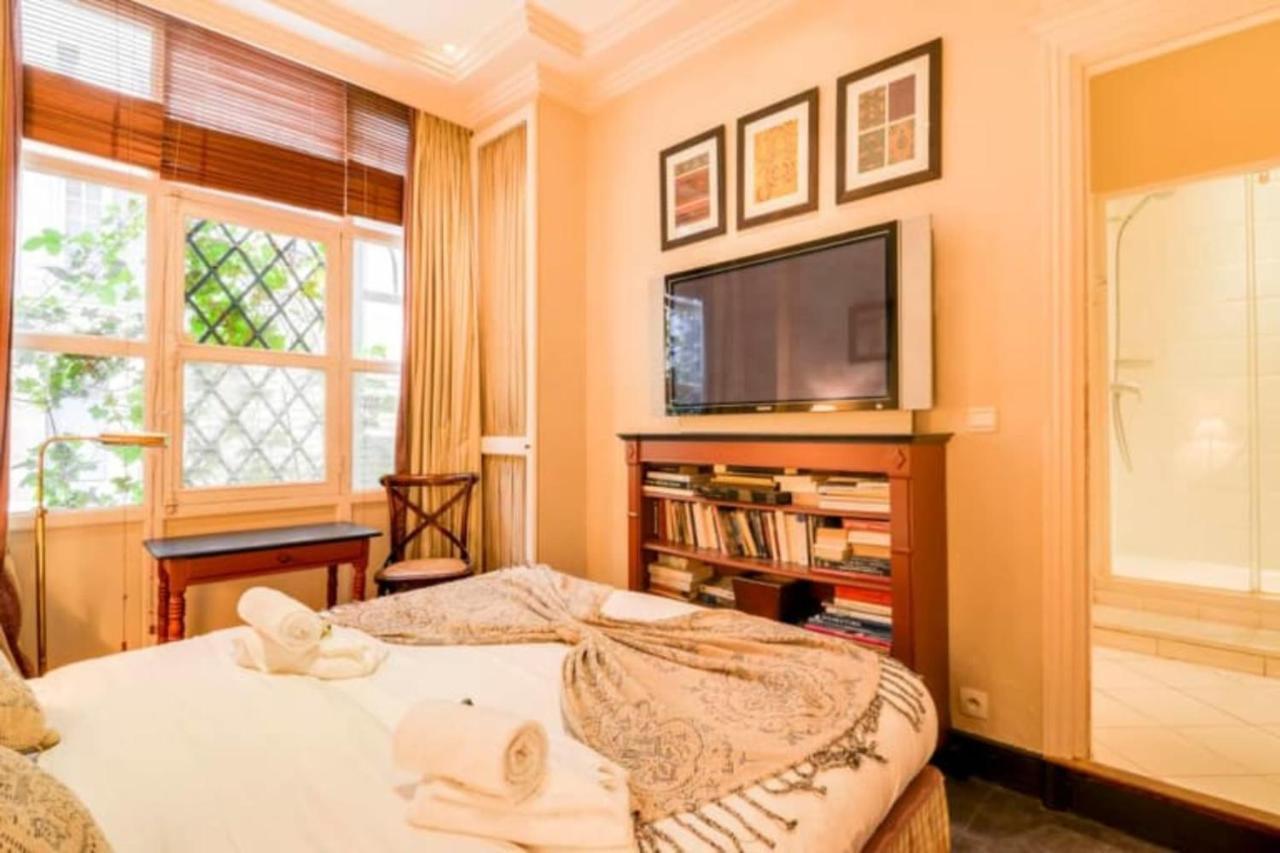Appartamento Guestready - Classic Parisian In Marais Parigi