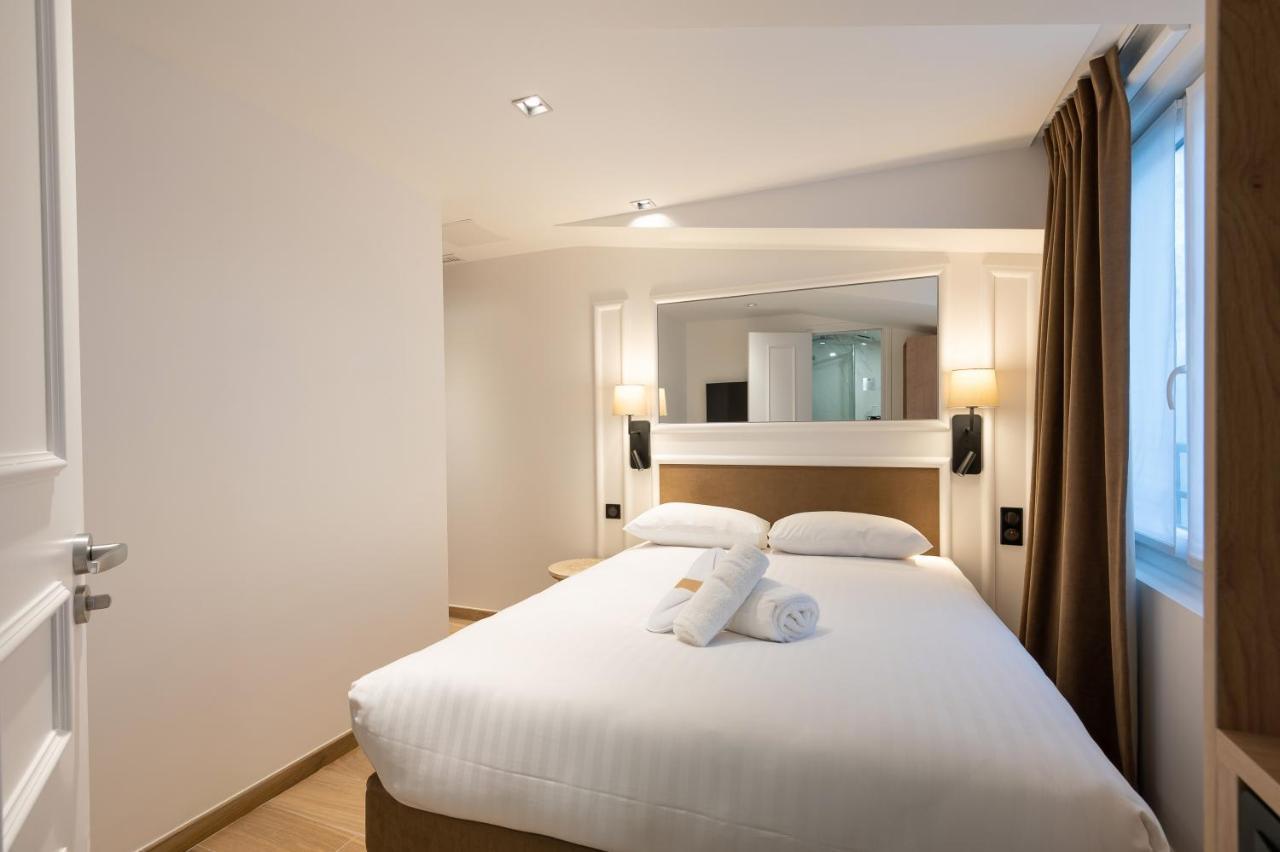 Hotel Au Coeur De Republique Parigi
