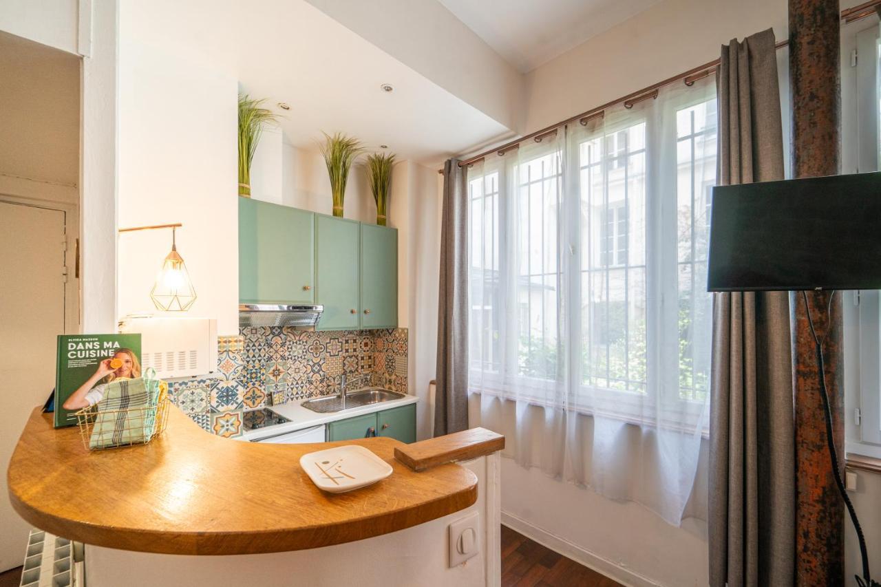 Happy - Tournelles Garden Apartment Paris
