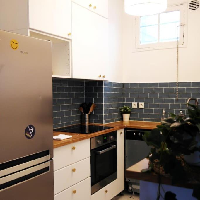 Haussmanannien Cosy - Republique Apartment *