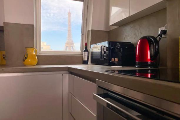 Les Toits De Rue Cler Vue Tour Eiffel Appartamento Parigi