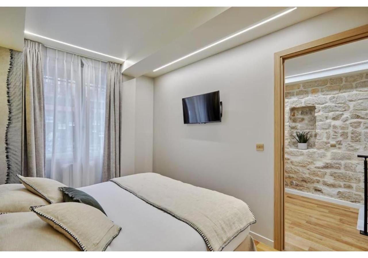 Appartamento Le Marais Place Des Vosges By Prestige Parigi