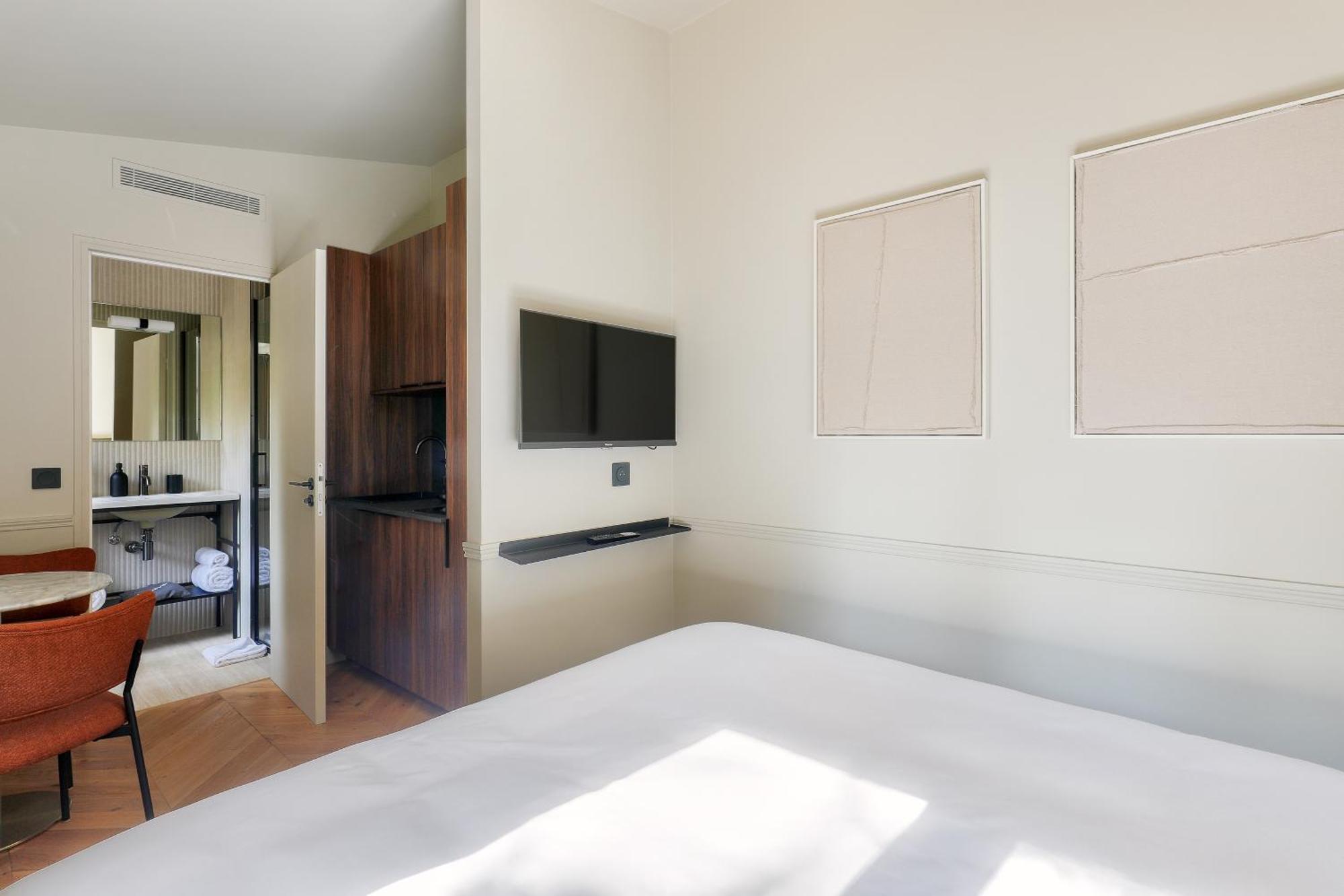 Maison Du Moulin Aparthotel Parigi