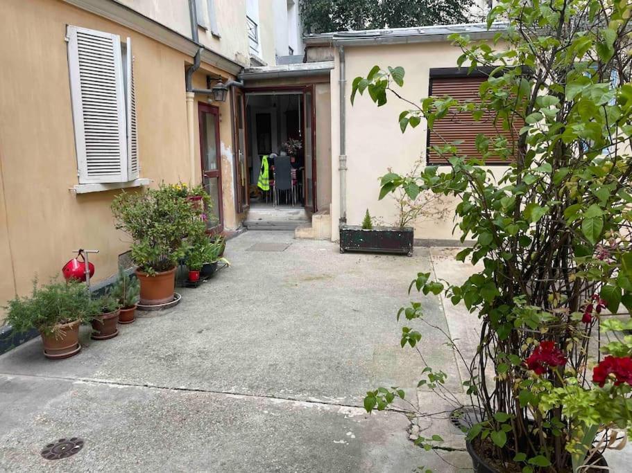 Chezadrienparis - De 90m2 En Souplex Parigi