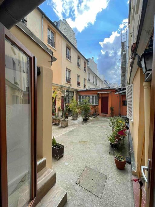 Appartamento Chezadrienparis - De 90m2 En Souplex Parigi